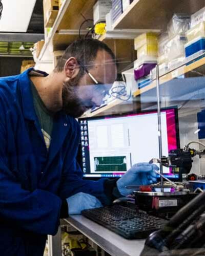 PhD student works in bioengineering lab